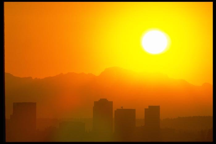 001000 Bright Yellow Sun Over City A4 Photo Print