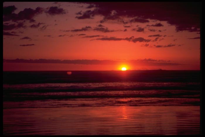 001006 Red Double Sun, Silhouetted Clouds A4 Photo Print