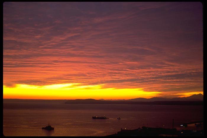 001008 Low Red Clouds Over Boats On Sound A4 Photo Print