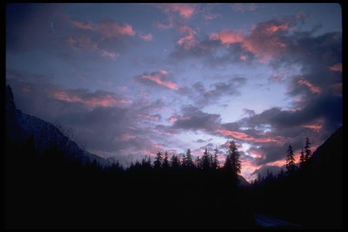001017 Purple And Orange Sunset Over Trees And Hills A4 Photo Print