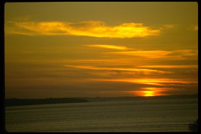 001034 Sunglow Through Layered Clouds A4 Photo Print