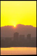 001047 Yellow Sun Peeking Behind Clouds Over City A4 Photo Print