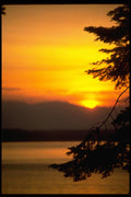 001057 Sunset Behind Hills Over Water, Trees A4 Photo Print