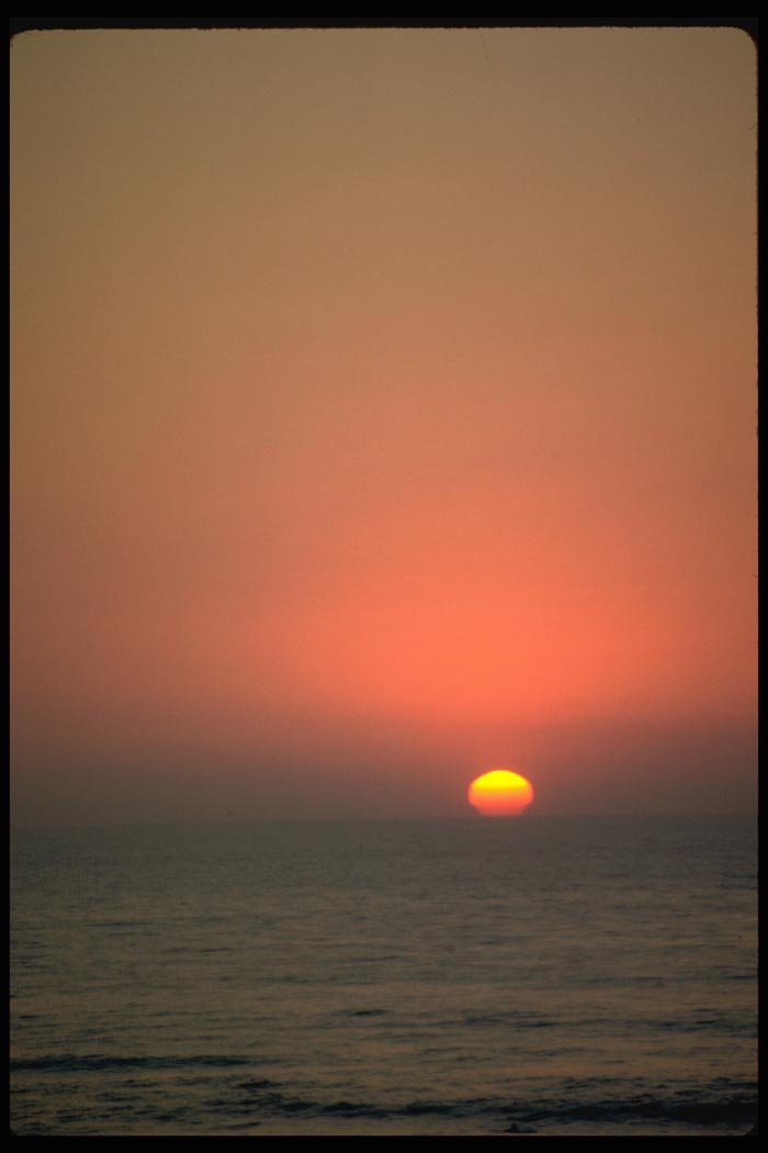 001063 Striped Sun, Clear Sky Over Sea A4 Photo Print