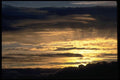 001067 Backlit Clouds Over Mountain A4 Photo Print