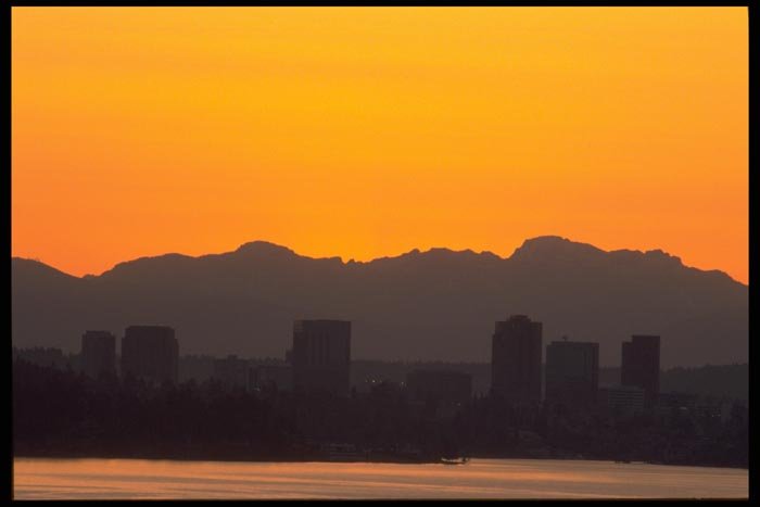 001079 Orange Dawn Behind City A4 Photo Print