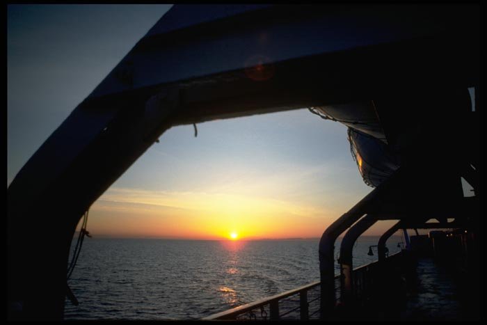 001091 Sunset Through Lifeboat Arches A4 Photo Print