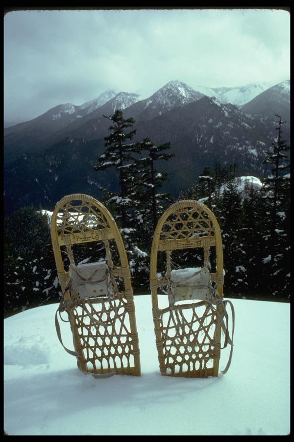 002018 Snowshoes In Front Of Peaks A4 Photo Print
