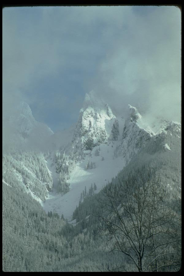 002021 Jagged Peak Shrouded With Clouds A4 Photo Print