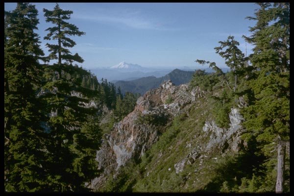 002061 Mountains Behind Red Outcropping A4 Photo Print