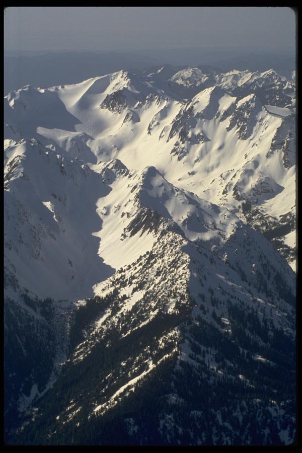 002072 Snowy Ravine, Distant Mountains A4 Photo Print