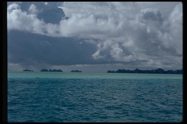 005003 Storm Clouds Over Islands, Green Seas A4 Photo Print