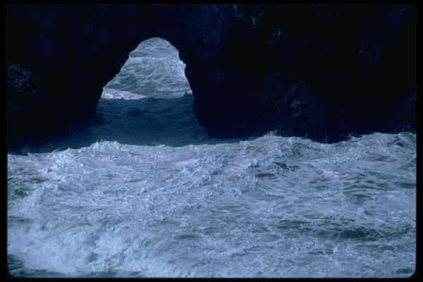 005013 White Foam Under Arched Rock A4 Photo Print