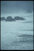 005015 Hazy, Frothy Ocean Near Rocks A4 Photo Print