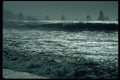 005016 Tall Rocks Silhouetted In Sea A4 Photo Print