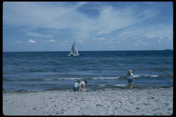 005030 Sailboat, Children Playing On Shore A4 Photo Print