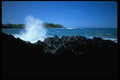 005038 Wave Breaking On Rocks In Tropical Bay A4 Photo Print