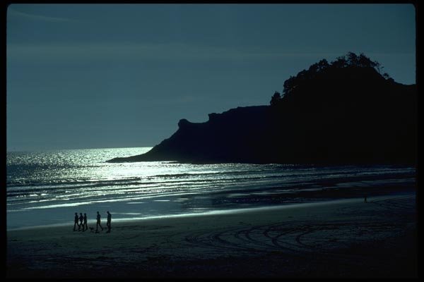 005060 People Silhouetted On Beach A4 Photo Print