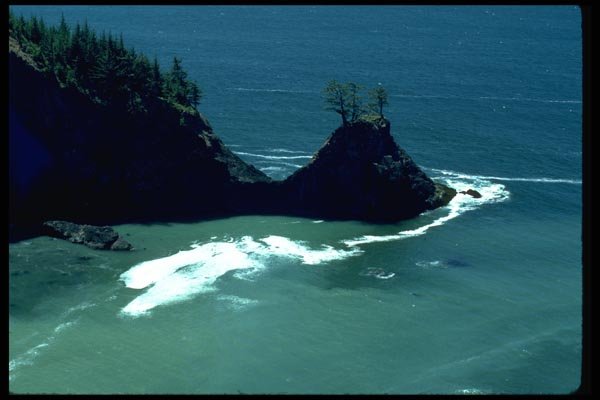 005064 Cleft In Peninsula With Green Sea A4 Photo Print