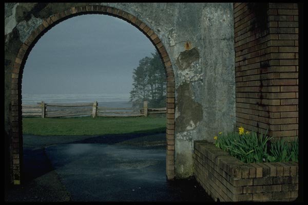 005096 Ocean View Through Brick Arch, Fence A4 Photo Print