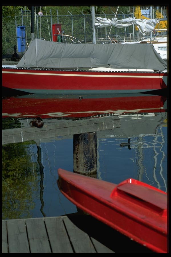 007047 Red Sailboat Covered At Dock A4 Photo Print
