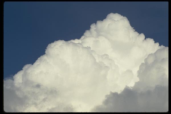 011001 White Peaked Cloud, Blue Sky A4 Photo Print