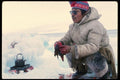 014090 Inuk Hunter Eating Fresh Seal A4 Photo Print