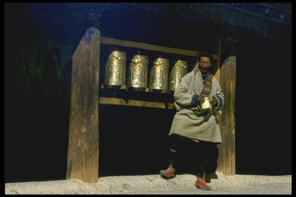 015066 rayer Wheels & Man In Dreprung Monastery, Lhasa, Tibet A4 Photo Print
