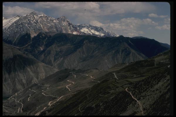 015099 Winding Mountain Road, Eastern Tibet A4 Photo Print
