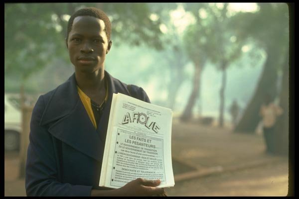 016023 Newspaper Boy In Bamako, Mali A4 Photo Print