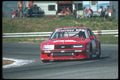 021033 Red Mustang In Turn A4 Photo Print