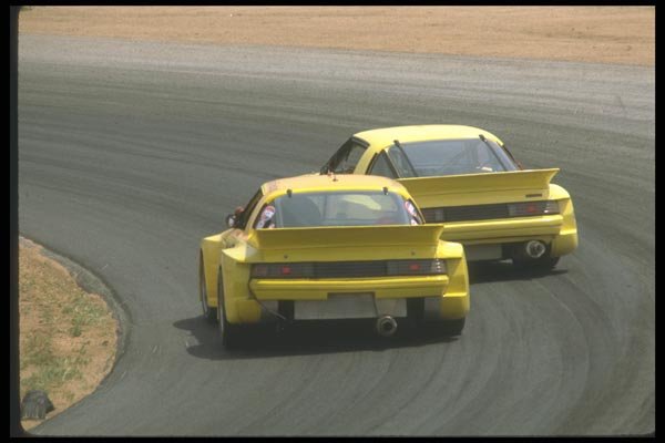 021035 Two RX7s In Turn, Rear View A4 Photo Print