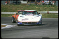 021068 White Corvette In Turn A4 Photo Print
