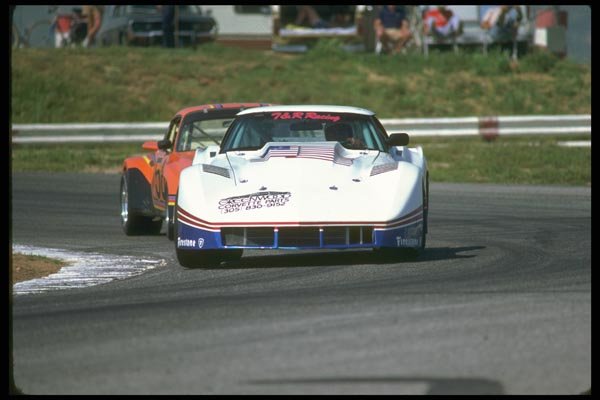 021068 White Corvette In Turn A4 Photo Print