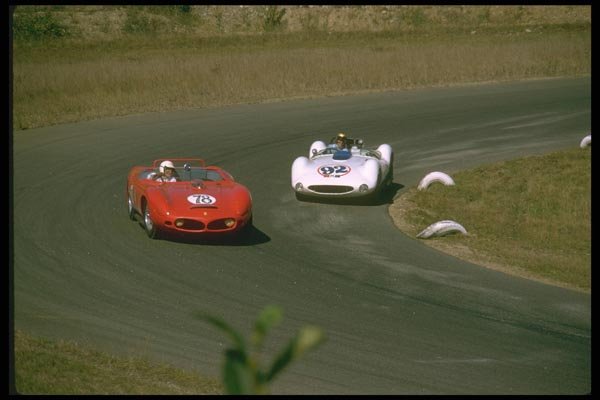 021094 Ferrari And Maserati In Turn A4 Photo Print