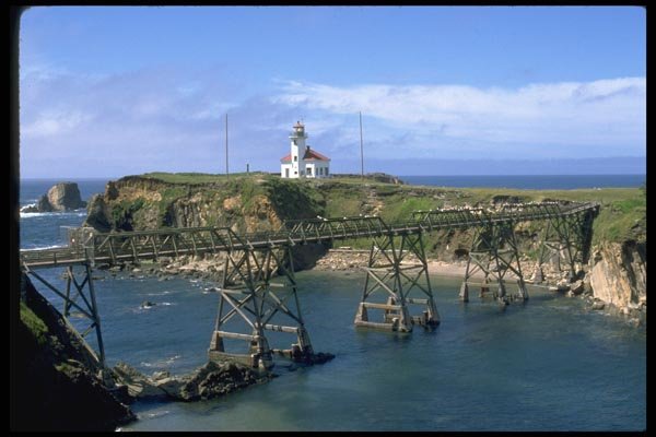 022012 Railroad Bridge In Front Of Lighthouse A4 Photo Print