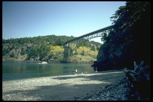 022031 Beach, Boat And Steel Arched Bridge A4 Photo Print