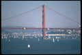 022074 Red Suspension Bridge With Sailboats A4 Photo Print