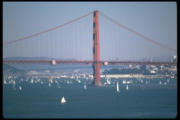 022074 Red Suspension Bridge With Sailboats A4 Photo Print