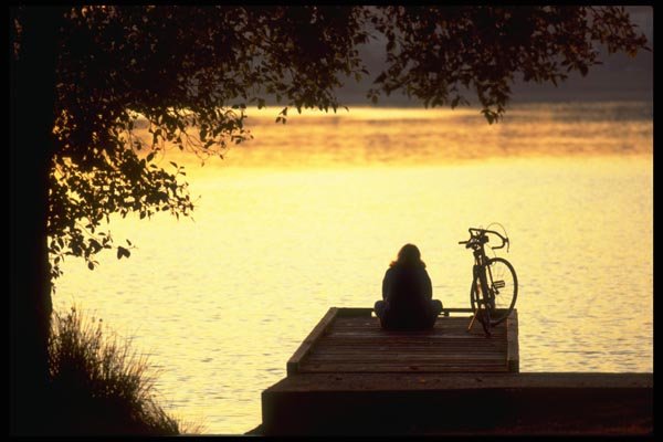 023032 Cyclist Sitting On Dock A4 Photo Print