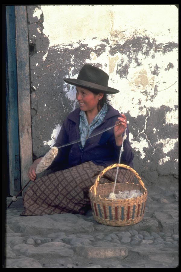 023034 Woman Spinning Wool From Basket A4 Photo Print