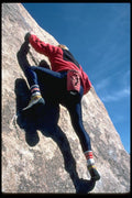 023048 Man Climbing Rock Face A4 Photo Print