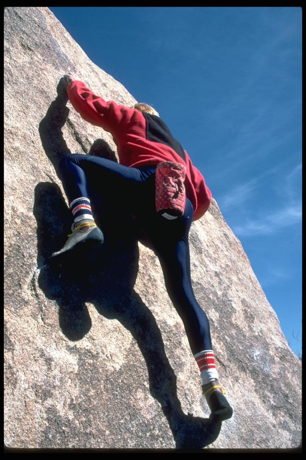 023048 Man Climbing Rock Face A4 Photo Print