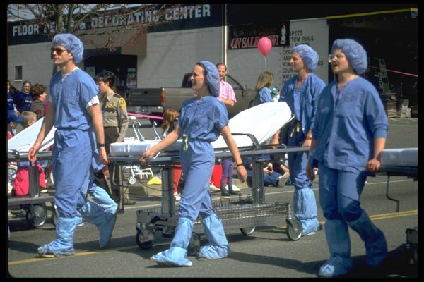023058 Nurses With Beds In Parade A4 Photo Print