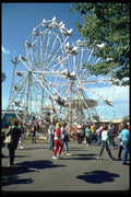 023061 Ferris Wheels At The Fair A4 Photo Print