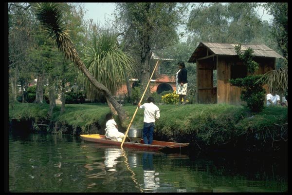 023076 Couple In Canoe Tropics A4 Photo Print