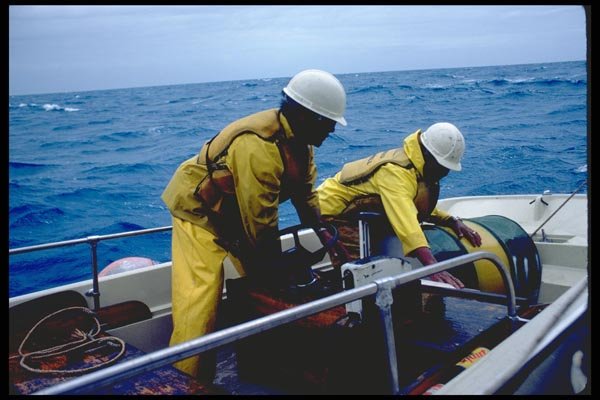 023083 Men Working On Vessel A4 Photo Print