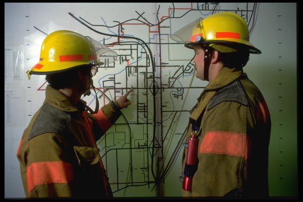 023084 Firemen At Wall Map A4 Photo Print