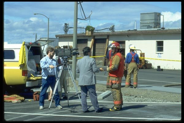 023086 Tv Report After Fire A4 Photo Print