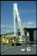 023089 Yellow Fire Truck Boom And Bottles A4 Photo Print